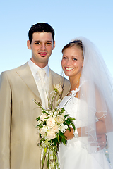 Image showing Happy wedding couple smiling