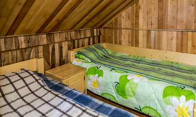 Image showing Bedroom in a Wooden Chalet