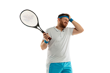 Image showing Funny emotions of professional tennis player isolated on white studio background, excitement in game