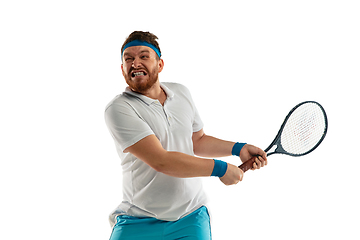 Image showing Funny emotions of professional tennis player isolated on white studio background, excitement in game