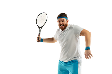 Image showing Funny emotions of professional tennis player isolated on white studio background, excitement in game