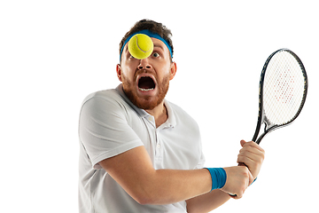 Image showing Funny emotions of professional tennis player isolated on white studio background, excitement in game