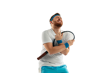 Image showing Funny emotions of professional tennis player isolated on white studio background, excitement in game