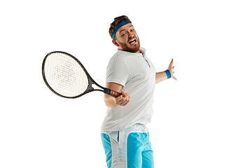 Image showing Funny emotions of professional tennis player isolated on white studio background, excitement in game