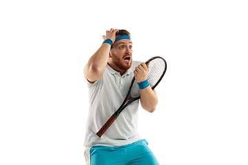 Image showing Funny emotions of professional tennis player isolated on white studio background, excitement in game