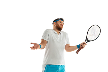 Image showing Funny emotions of professional tennis player isolated on white studio background, excitement in game