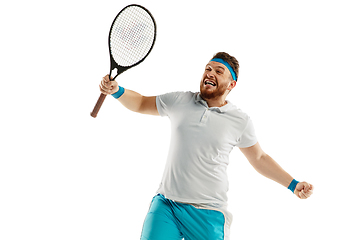 Image showing Funny emotions of professional tennis player isolated on white studio background, excitement in game