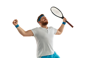 Image showing Funny emotions of professional tennis player isolated on white studio background, excitement in game