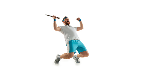 Image showing Funny emotions of professional tennis player isolated on white studio background, excitement in game