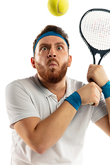 Image showing Funny emotions of professional tennis player isolated on white studio background, excitement in game