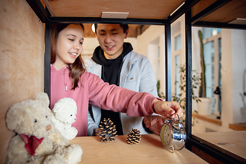 Image showing New property owners, young couple moving to new home, apartment, look happy