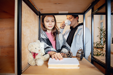 Image showing New property owners, young couple moving to new home, apartment, look happy