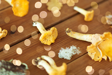 Image showing chanterelles on wooden background