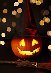 Image showing halloween jack-o-lantern in witch's hat and broom