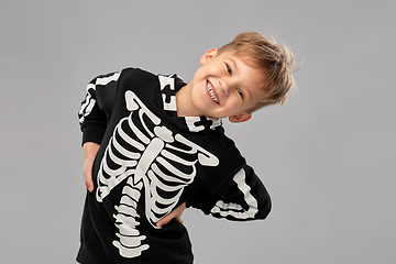 Image showing boy in black halloween costume with skeleton bones