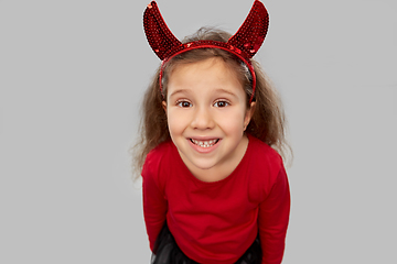 Image showing girl in halloween costume and devil's horns