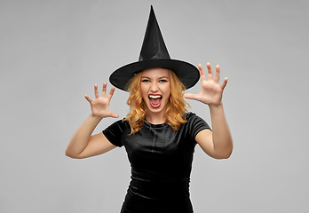 Image showing scary woman in black halloween costume of witch