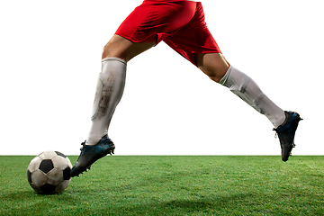 Image showing Close up legs of professional soccer, football player fighting for ball on field isolated on white background