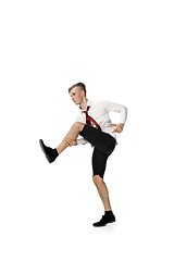 Image showing Happy young man dancing in casual clothes or suit, remaking legendary moves of celebrity from culture history