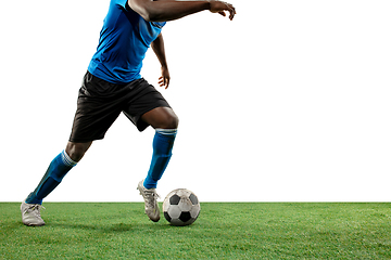 Image showing Close up legs of professional soccer, football player fighting for ball on field isolated on white background