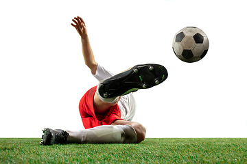 Image showing Close up legs of professional soccer, football player fighting for ball on field isolated on white background