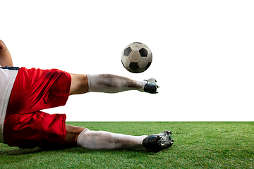 Image showing Close up legs of professional soccer, football player fighting for ball on field isolated on white background