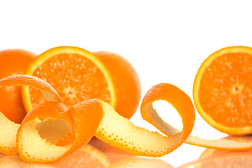 Image showing Orange peel and juicy oranges