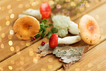 Image showing russule mushrooms on wooden background