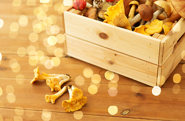 Image showing wooden box of different edible mushrooms