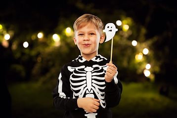 Image showing boy in halloween costume with ghost decoration