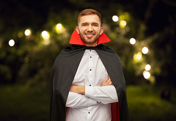 Image showing happy man in halloween costume of vampire