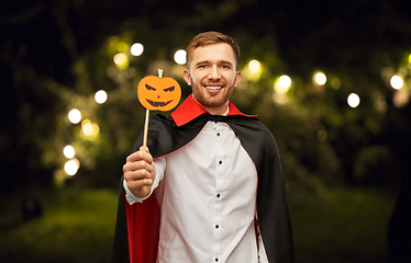 Image showing happy man in halloween costume of vampire