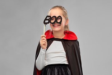 Image showing girl in costume of dracula with cape on halloween