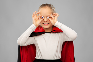 Image showing girl in halloween costume of dracula with eyeballs