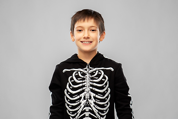 Image showing boy in black halloween costume with skeleton bones