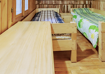 Image showing Bedroom in a Wooden Chalet