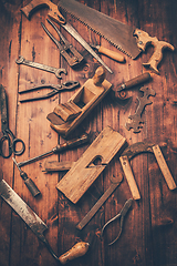 Image showing Assortment of old and rusty tools in workshop.