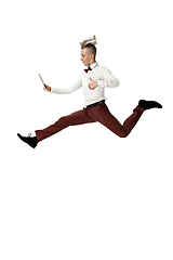 Image showing Happy young man dancing in casual clothes or suit, remaking legendary moves of celebrity from culture history