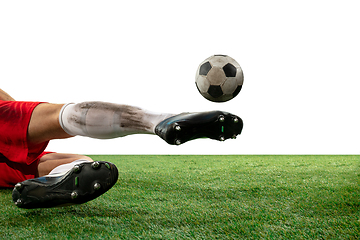 Image showing Close up legs of professional soccer, football player fighting for ball on field isolated on white background