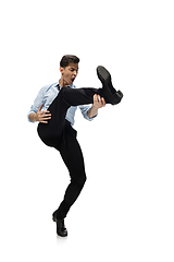 Image showing Happy young man dancing in casual clothes or suit, remaking legendary moves of celebrity from culture history