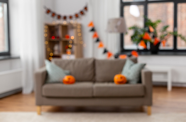 Image showing blurred home room decorated for halloween holiday