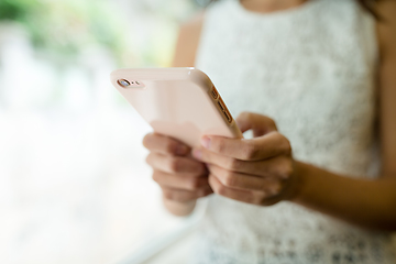 Image showing Woman using cellphone