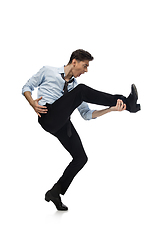 Image showing Happy young man dancing in casual clothes or suit, remaking legendary moves of celebrity from culture history