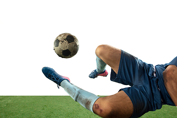 Image showing Close up legs of professional soccer, football player fighting for ball on field isolated on white background