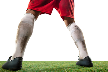 Image showing Close up legs of professional soccer, football player fighting for ball on field isolated on white background