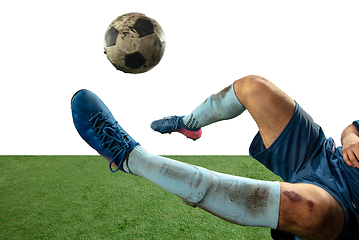 Image showing Close up legs of professional soccer, football player fighting for ball on field isolated on white background