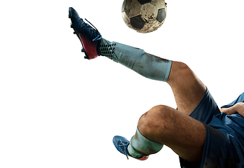 Image showing Close up legs of professional soccer, football player fighting for ball on field isolated on white background