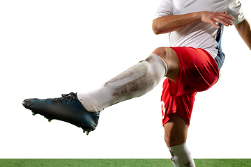 Image showing Close up legs of professional soccer, football player fighting for ball on field isolated on white background