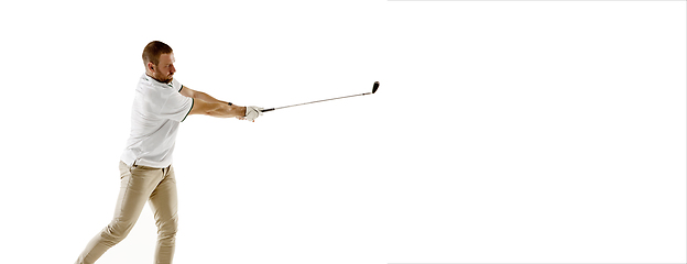 Image showing Golf player in a white shirt taking a swing isolated on white studio background