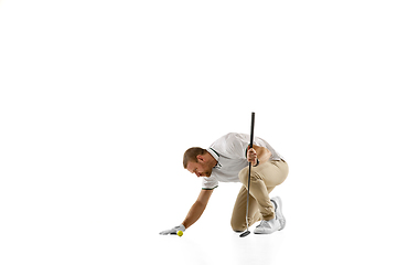 Image showing Golf player in a white shirt practicing, playing isolated on white studio background